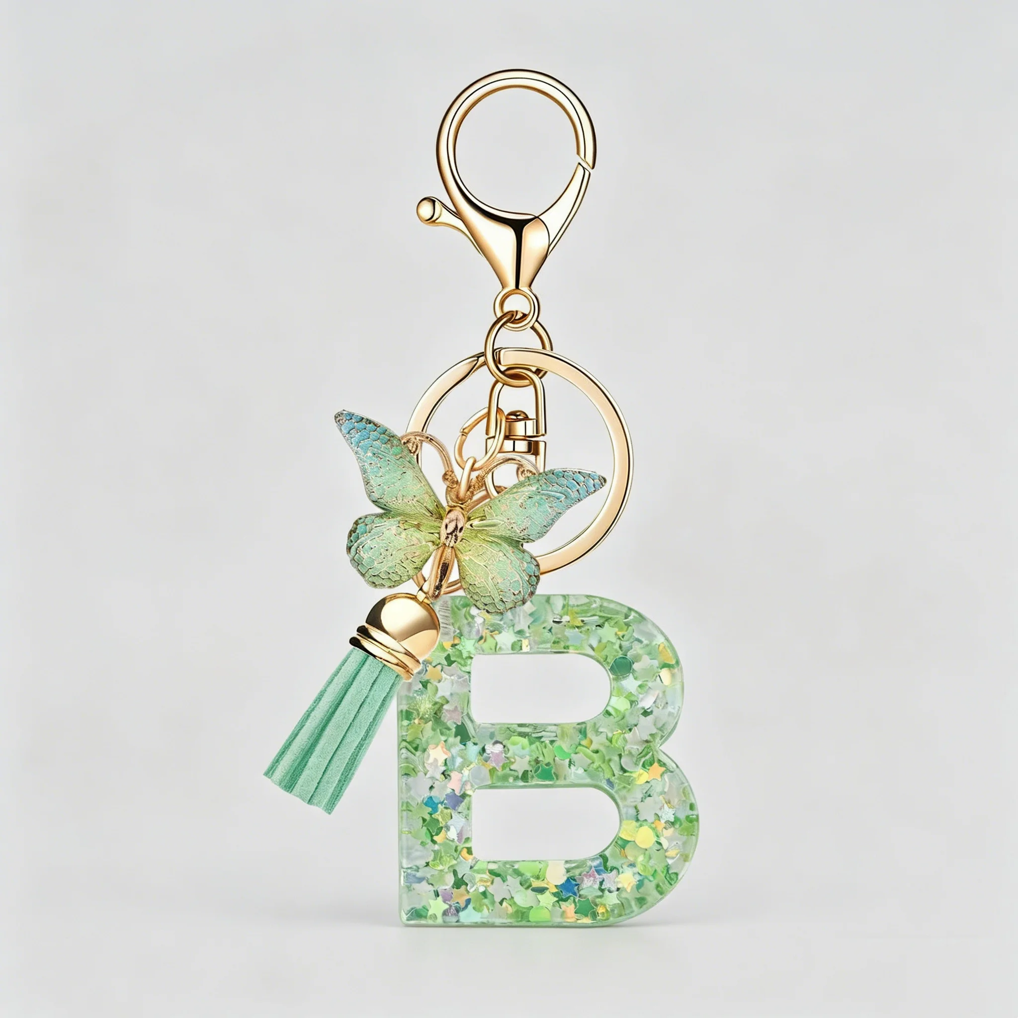 Damen Mode-Taschenanhänger 26 Alphabet-Schlüsselanhänger Quasten-Schmetterlingsanhänger Einzelstück Geschenk