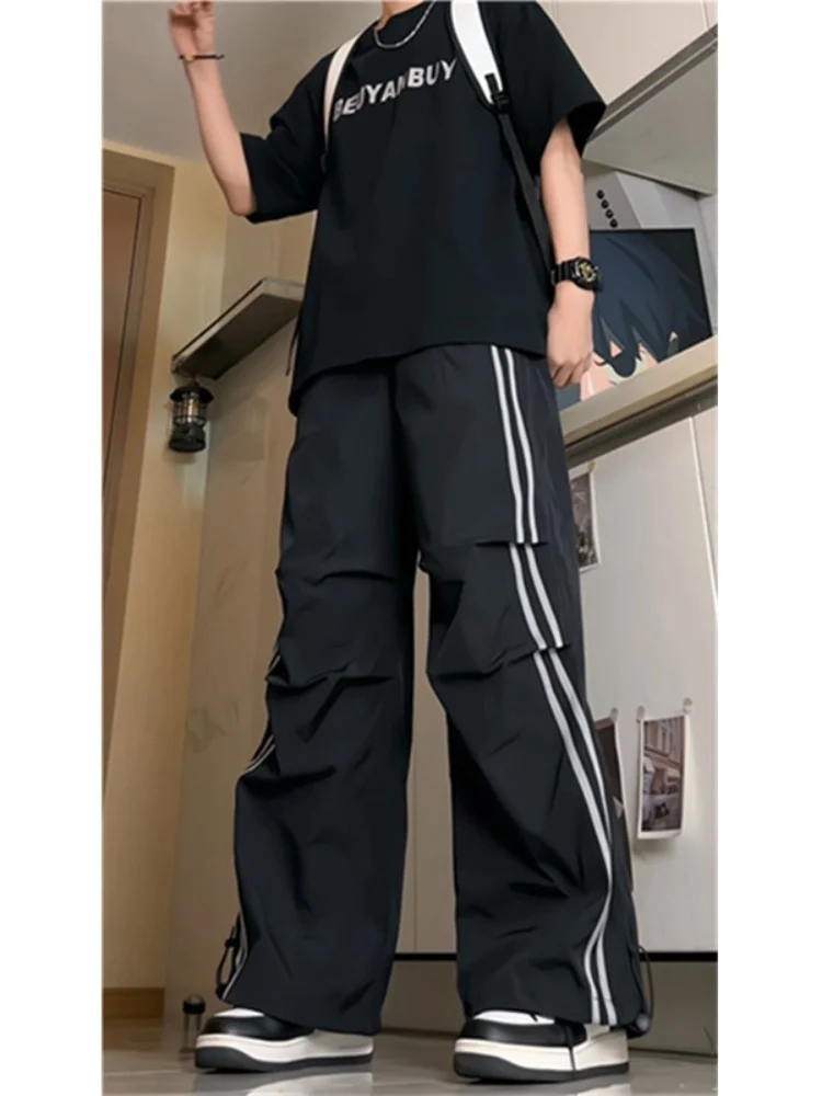 

Мужские рабочие брюки в полоску с лоскутным шитьем, прямые, свободные, струящиеся, широкие штанины, осенние, новые, в американском стиле, функциональные, в стиле парашютиста