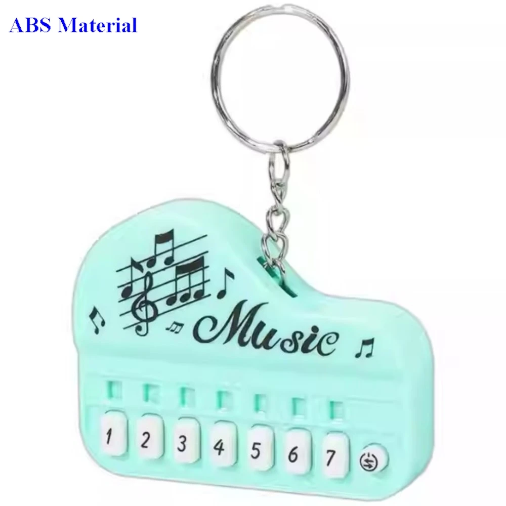 

1 PC Mini Piano With Music Playing and Light and Sound Keychain Pendant Glowing Electronic Pianos Key Ring Puzzle Toys Funny Toy