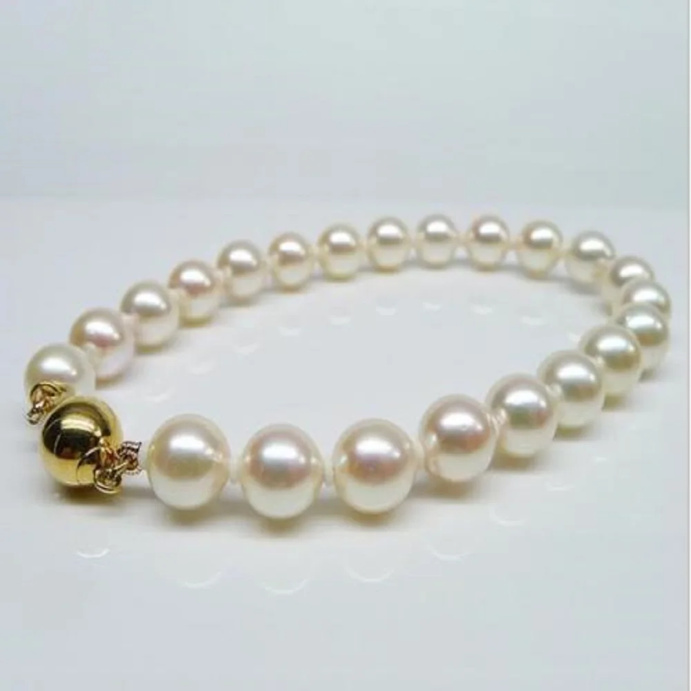 7.5-8-inch stunning AAA++6-7mm natural South  Sea white circular pearl bracelet in 14k gold color