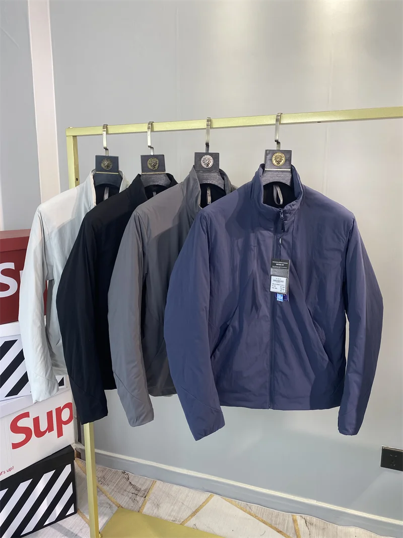 

Легкая модная зимняя куртка для мужчин с хлопковым утеплителем, воротником-стойкой, ветрозащитная, теплая, серия Ningya, для делового и повседневного стиля.