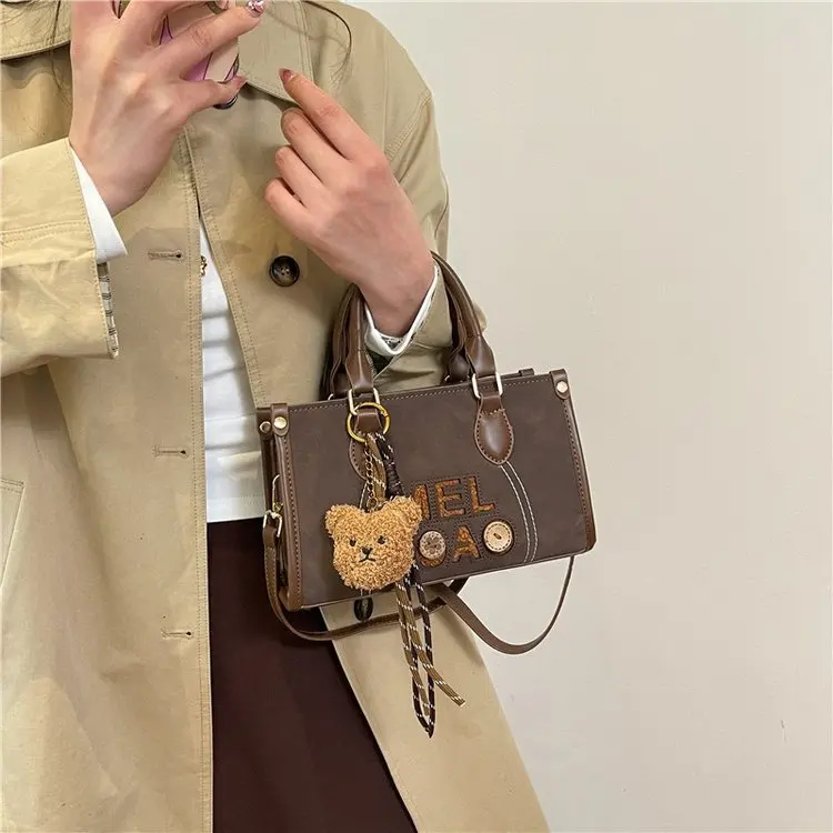 

2026 New Cute Bear Charm Boston Bag for Women Embroidery Letter Colorblock Leather Handheld Shoulder Crossbody Bag