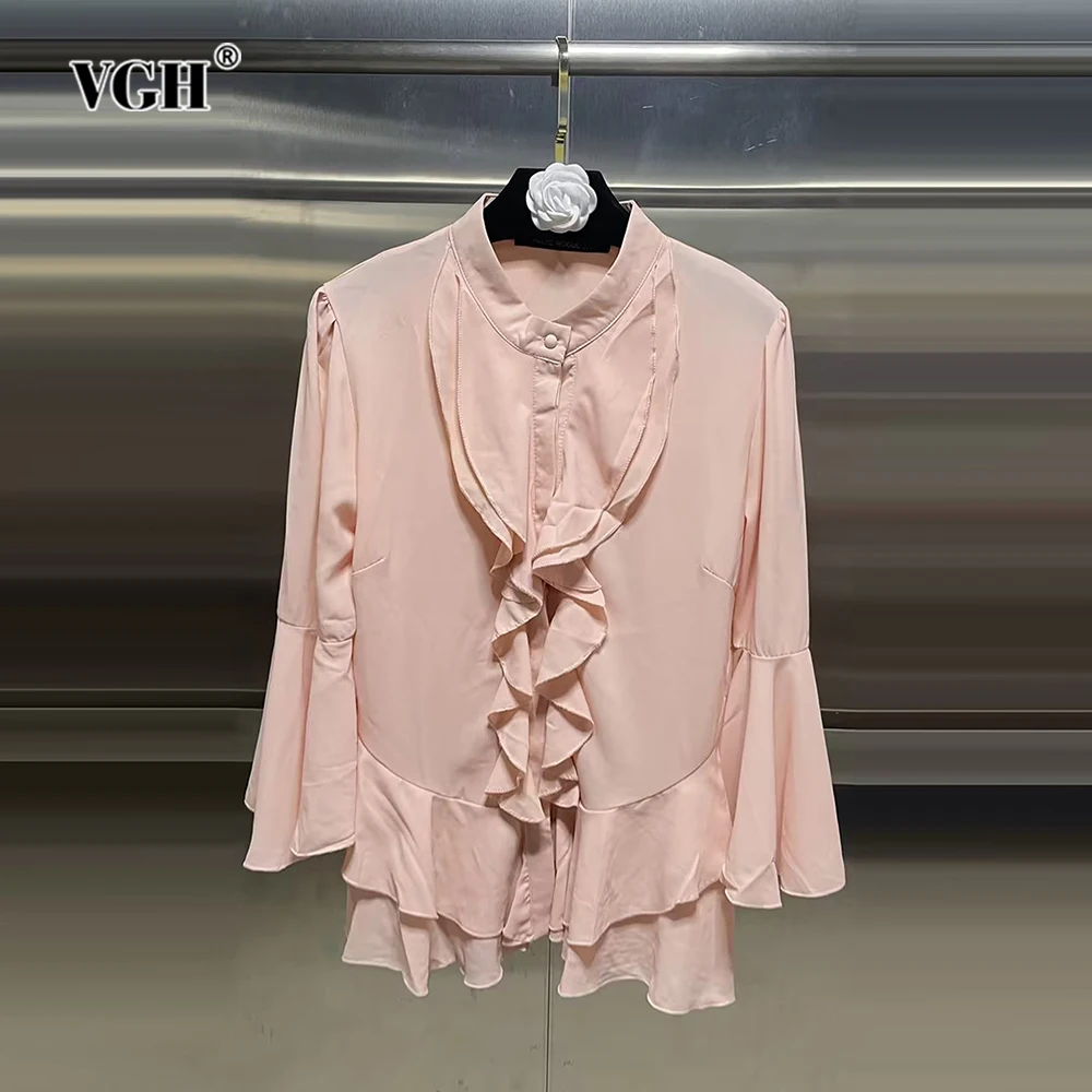 

VGH Casual Patchwork Ruffles Solid Shirts For Women Stand Collar Flare Sleeve Spliced Button Asymmetrical Hem Blouses Female New