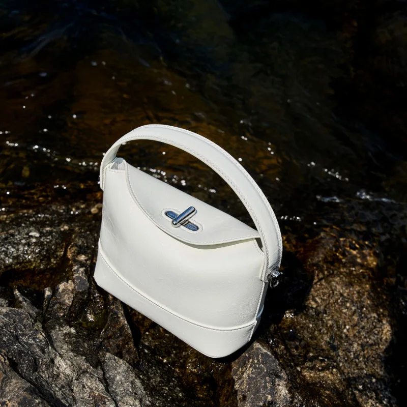 

First layer cowhide bag portable bucket bag 2025 spring new light luxury niche high-end leather women's bag manufacturers