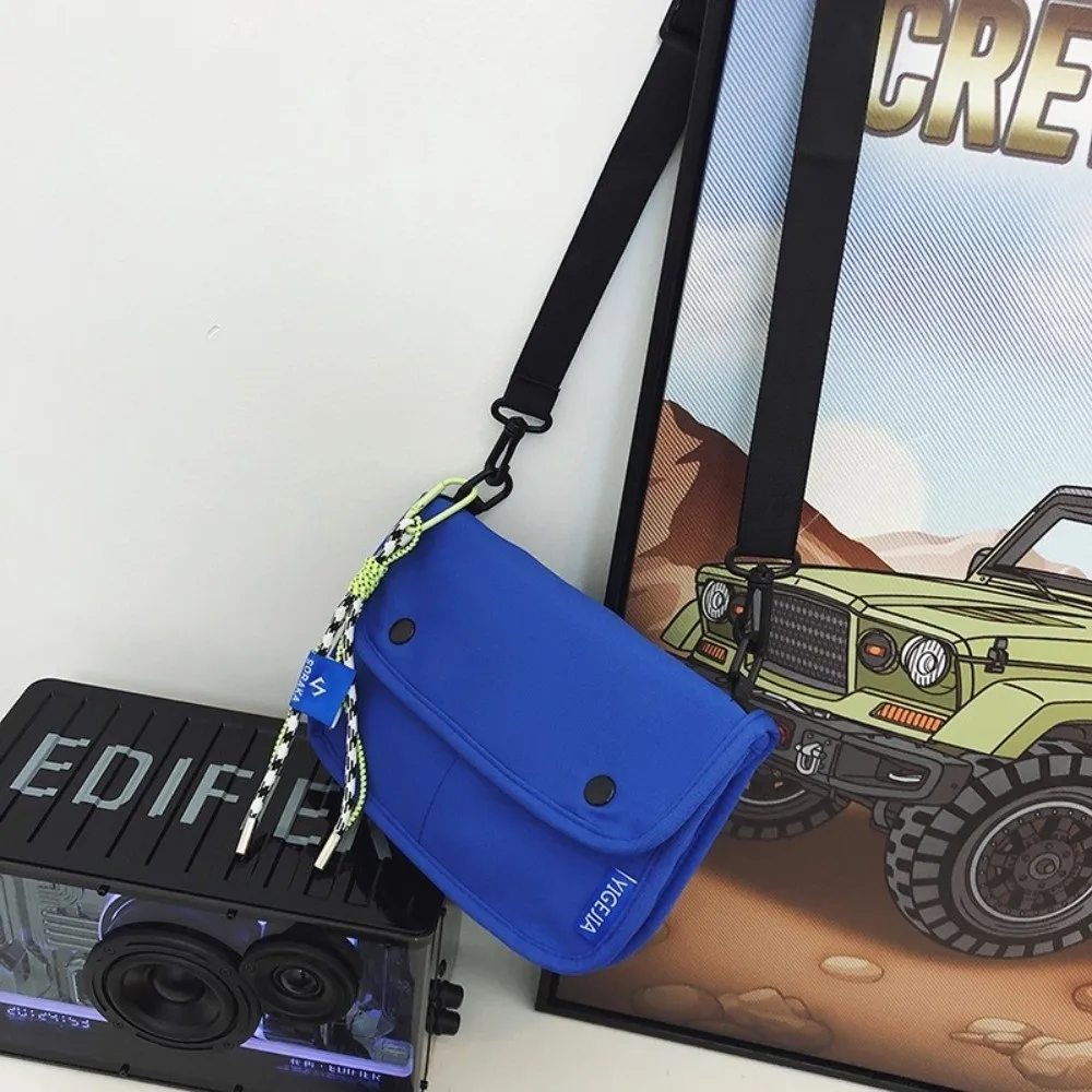 

Квадратная сумка для сообщений с несколькими карманами, однотонная нейлоновая сумка через плечо в корейском стиле с подвеской, большая вместительная мужская сумка на плечо