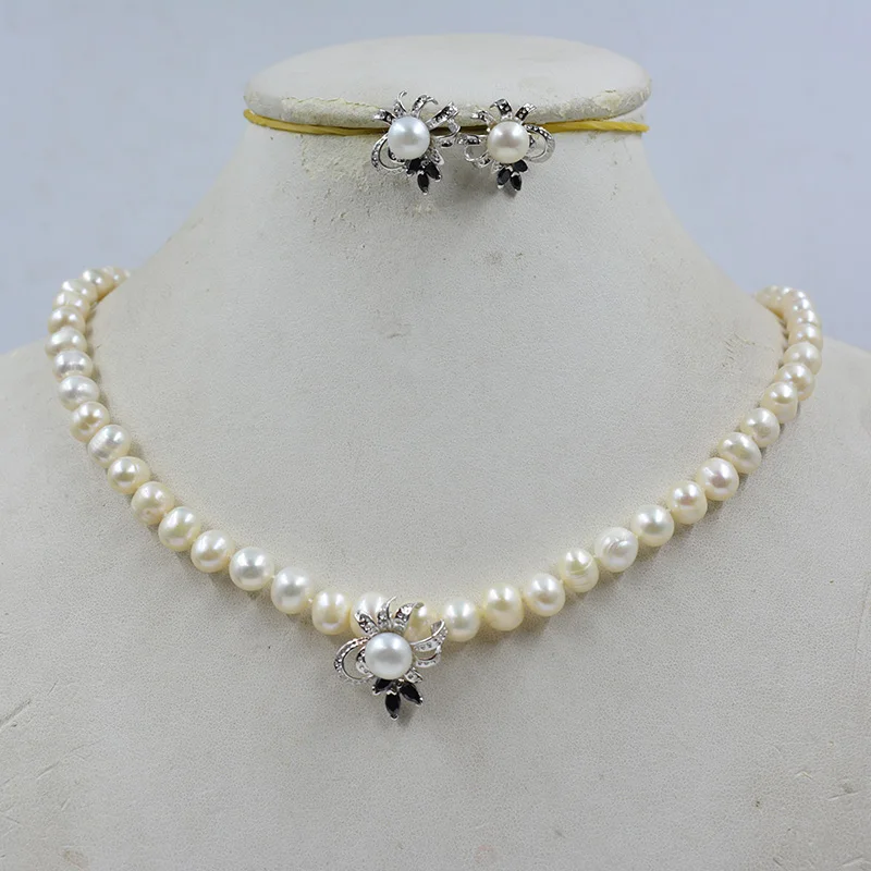 

7MM natural white freshwater pearl necklace earring set. The most beautiful gift for ladies 18”