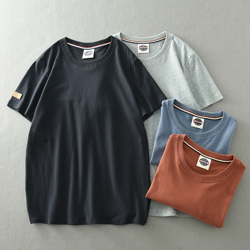 2025 novedad de verano, camiseta Retro americana de manga corta con cuello redondo de Color sólido, camisetas de tela de felpa informales lavadas de algodón 100% a la moda para hombre