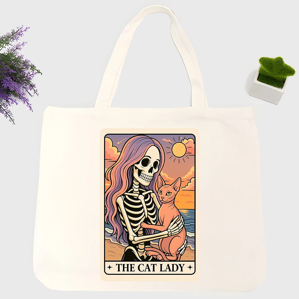 Women's skeleton and cat graphic canvas tote bag, retro vintage style for daily shopping and casual outings