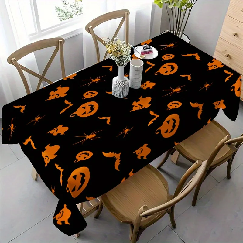 One Halloween tablecloth - rectangular polyester fabric tablecloth with patterns of pumpkins, spider webs and bats.