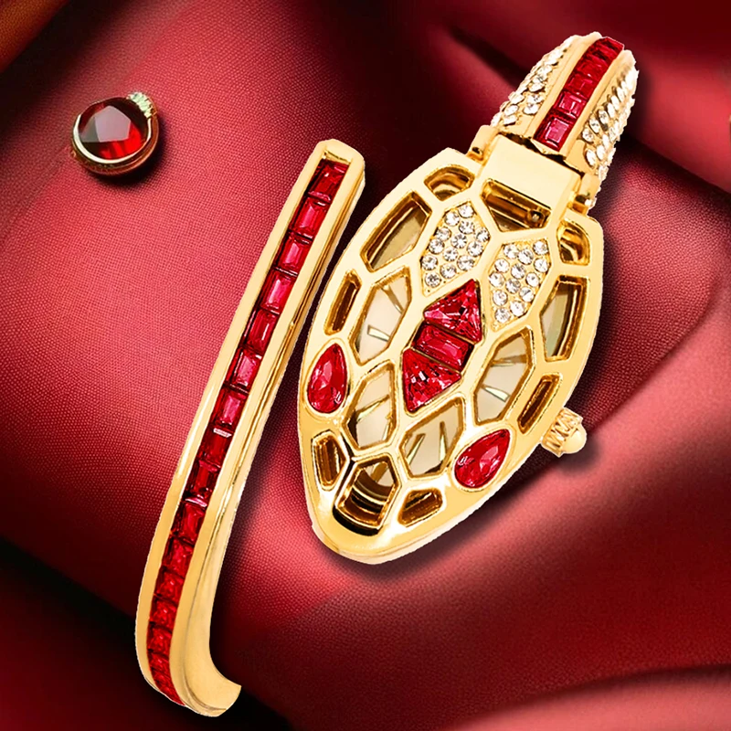 

A women's luxury-style vibrant red diamond hollow gold snake bracelet quartz watch