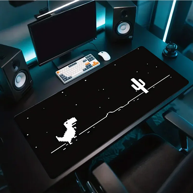 A Pixelated Dinosaur-cactus Design Desk Mat Available in Various Sizes, Suitable for Gaming Keyboards and Mice, and Ideal for Office Use. It Is an Ideal Gift