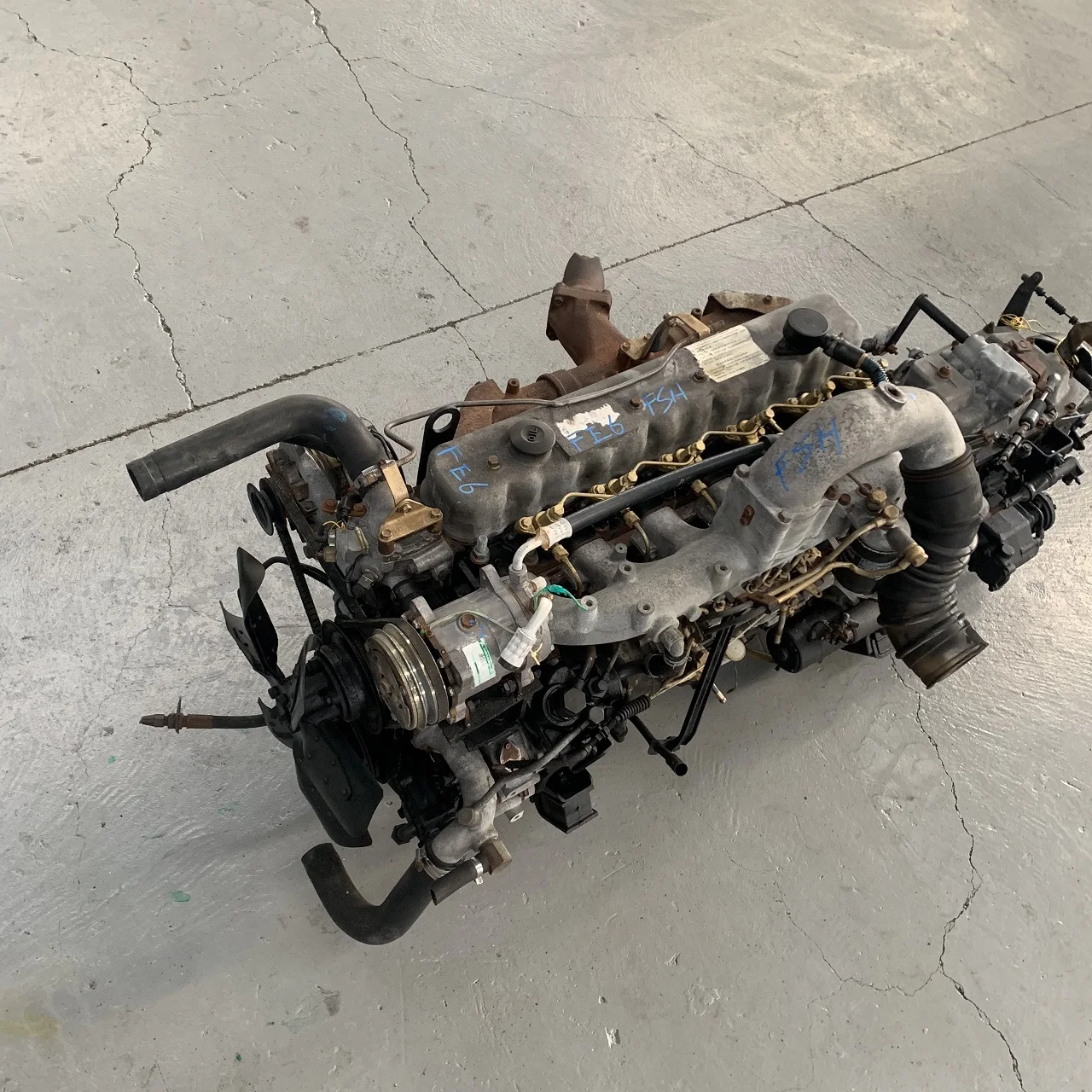 مجموعة محرك الديزل المستخدمة اليابان الأصلية المستخدمة لشاحنة نيسان FE6 6 أسطوانات 6.6L محرك مستعمل عالي الأداء على نطاق واسع