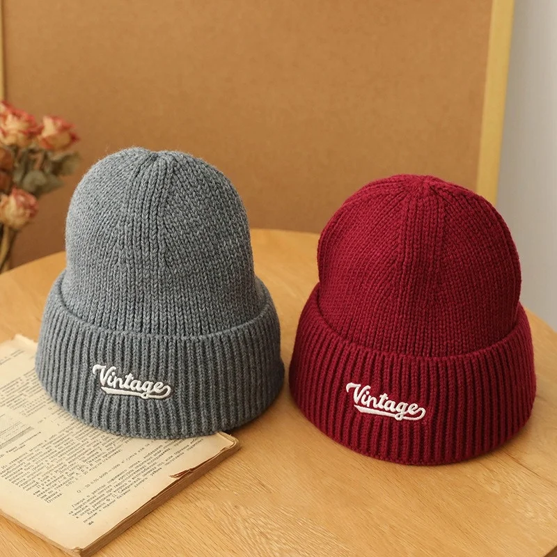 Embroidery knitted cap men and women winter warm ear protection tide head cover leisure versatile wool hat wholesale beanie boos