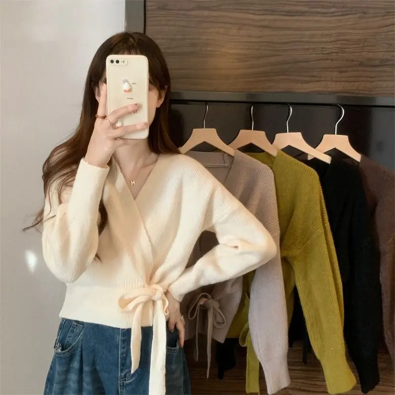 Cross shaped irregular strap waist slimming sweater cardigan women in autumn and winter chic lantern sleeve loose knit sweater