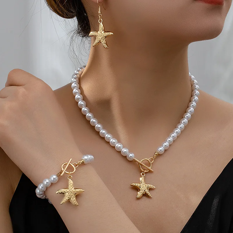 

Summer Beach Vacation Imitation Pearl Starfish Pendant Necklace Bracelet Earrings Three-piece Set for Women Fashion Jewelry Set