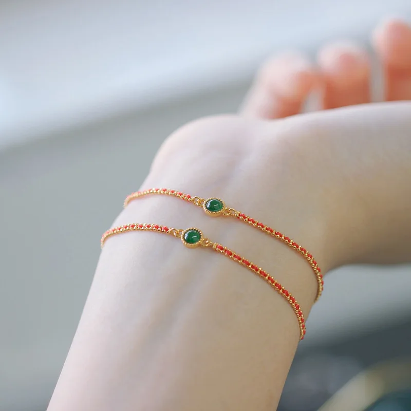 Natural Bracelet With Twisted Red Cord And Positive Green Jade Small Light Bulb Charm