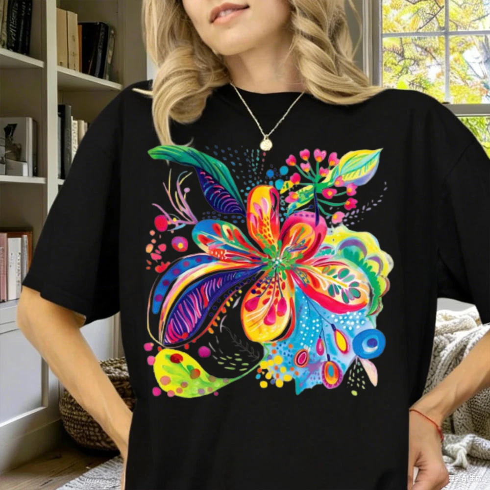 Whimsical Floral Explosion Art T-Shirt A Bold Psychedelic Burst Rainbow Colorful Botanical Petals Intricate Patterns Design Tee
