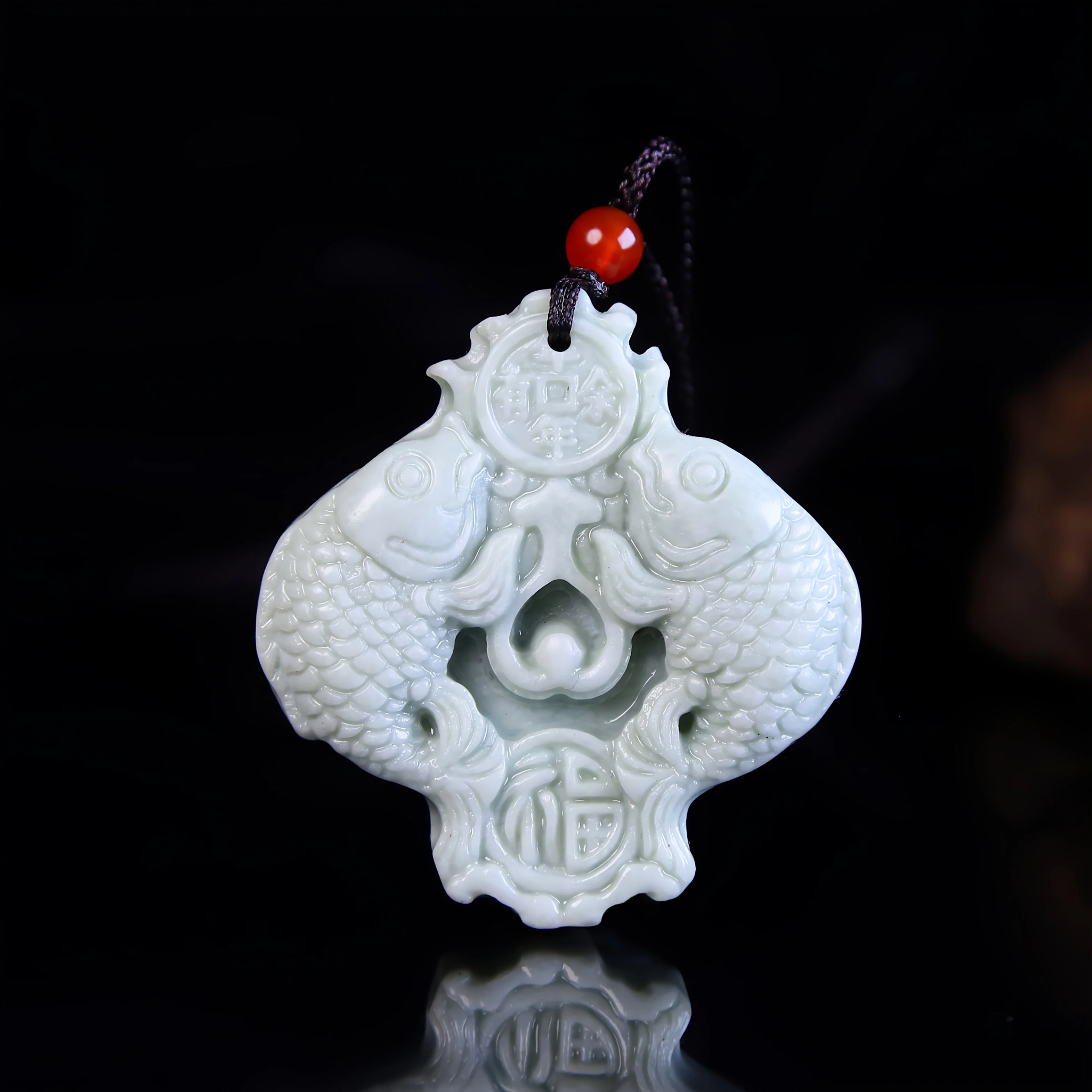 There are more than pendants in fine carving every year, men's and women's rough stone fish pendants