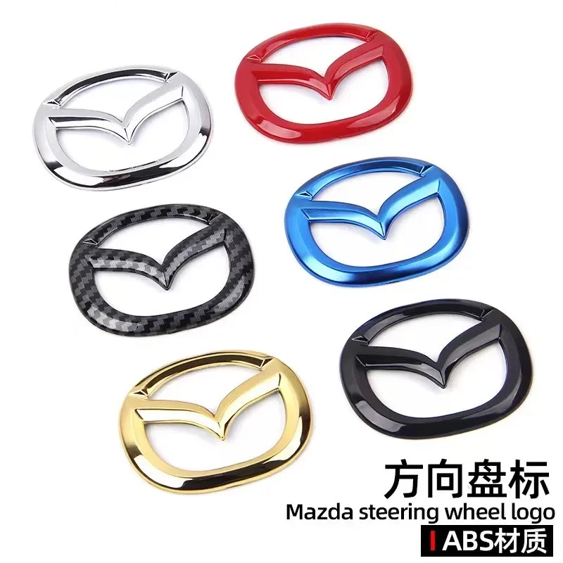 1 قطعة عجلة توجيه سيارة الجبهة شعار شارة لاصق الشعار لمازدا 2 3 5 6 7 323 626 Rx7 Rx8 Mx3 Mx5 Axela Atenza Cx-3 Cx-4 Mps