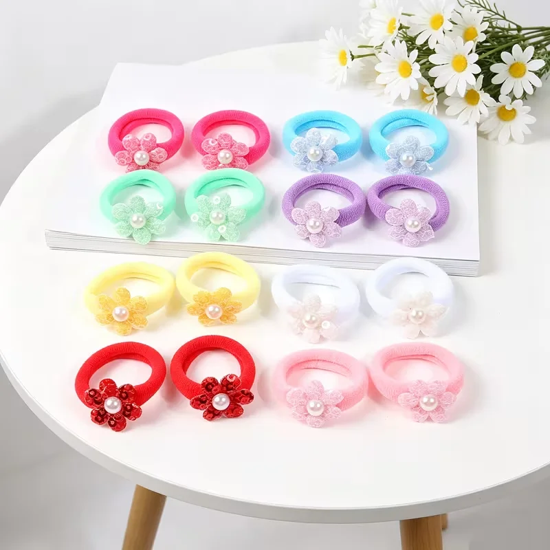 16 sequined small flower thumb hair loops, imitating pearl ponytails, with a fresh and sweet look.