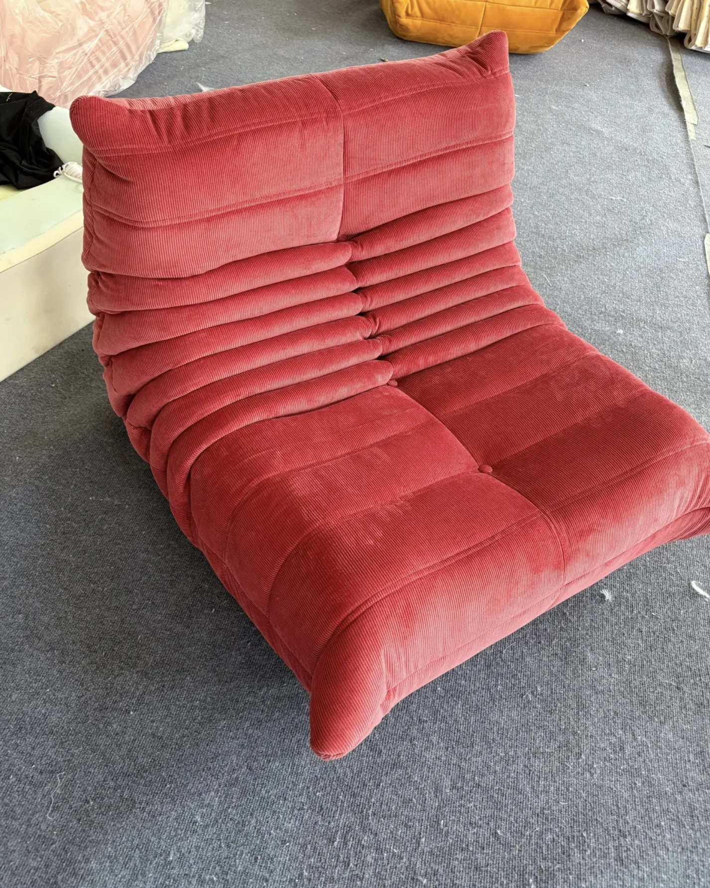 

Red corduroy sofa, stylish and atmospheric, a noble decoration in the living room, hotel bedroom