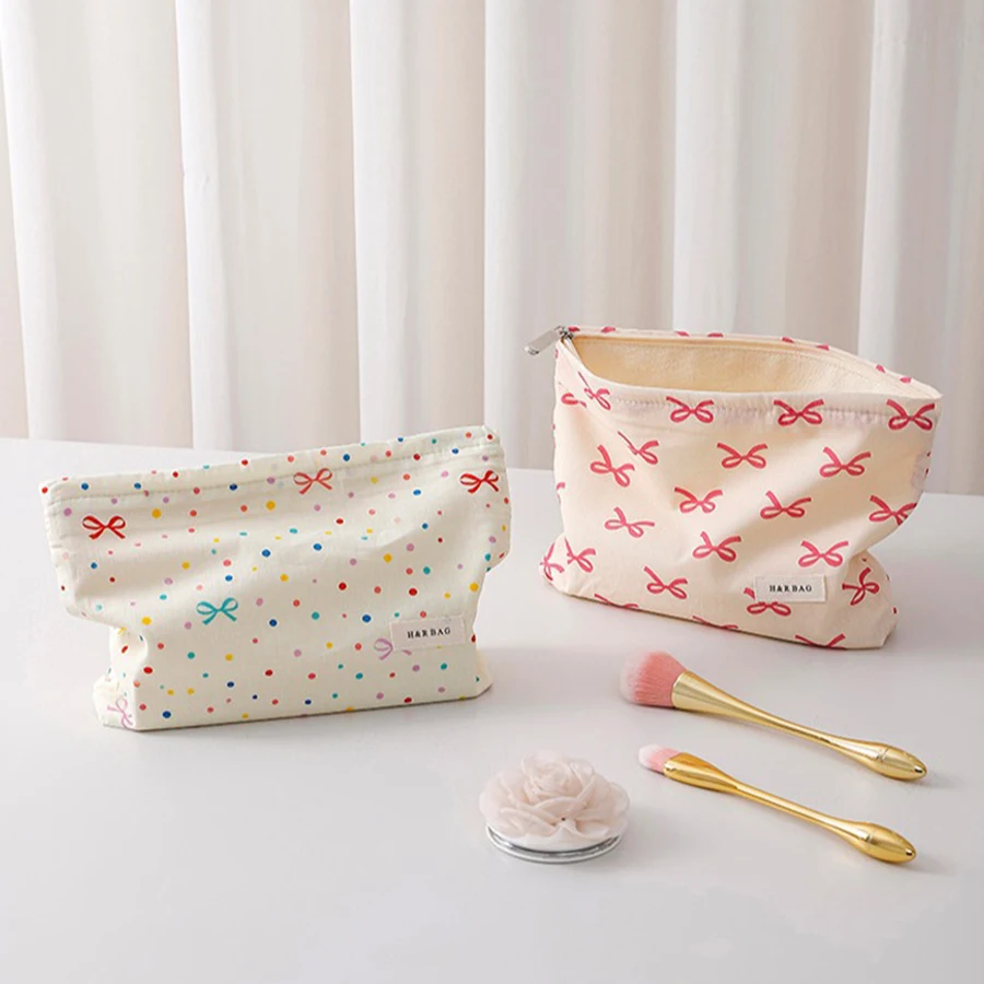 حقيبة مكياج بسحاب مطبوع عليها نمط فيونكة مصممة بشكل بسيط، حقيبة تخزين مستحضرات التجميل خفيفة الوزن ومتعددة الوظائف للنساء