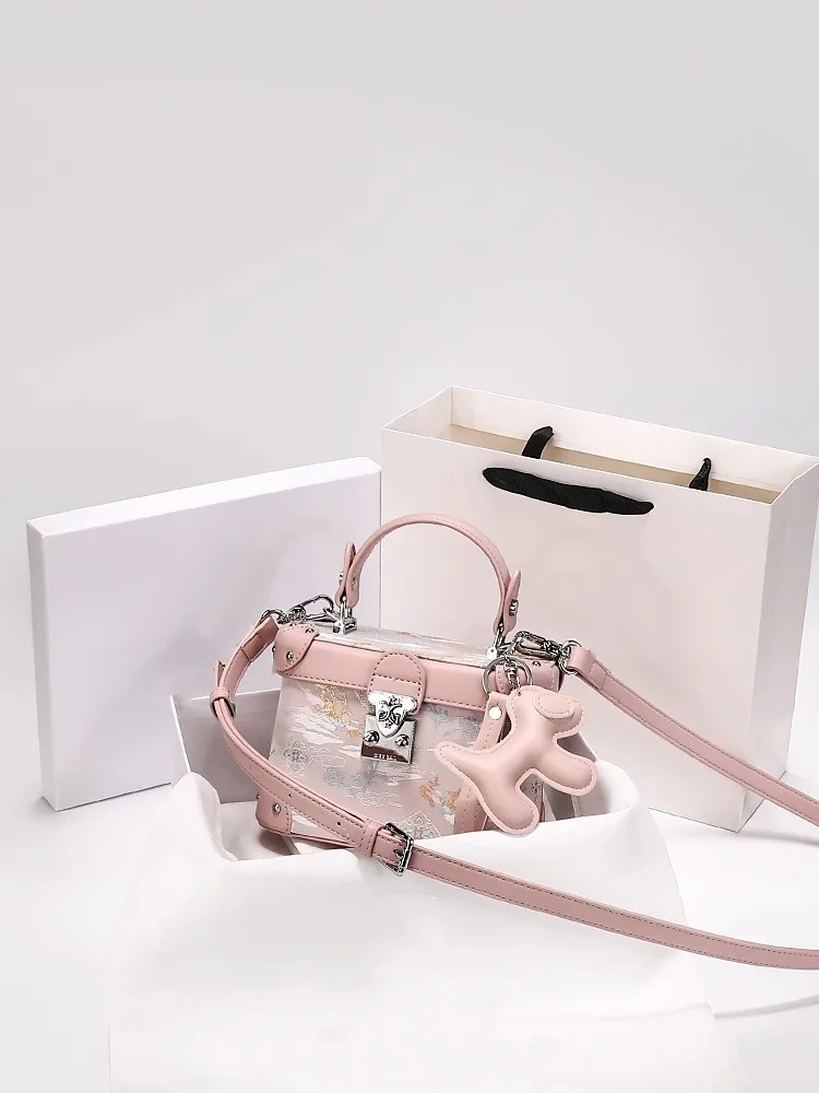 

Chinese Style and Luxury Makeup Bag with Charming Decoration Embroidery and Pendant Women's Stylish Handheld Crossbody Bag