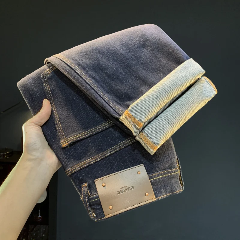 

Light luxury fashionable jeans men, autumn 2025 new style, loose and slimming, dark blue trendy plus size men's pants