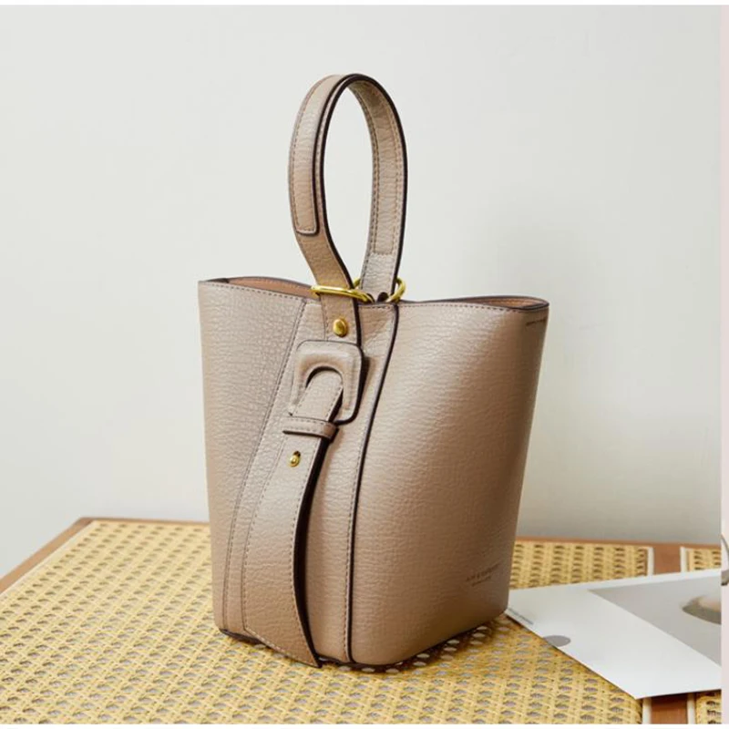 

Luxury Leather Bucket Bag Rivet Belt Buckle Design Handbag With Bag Inside Elegant Women's Commute Shoulder Crossbody Bag Purse