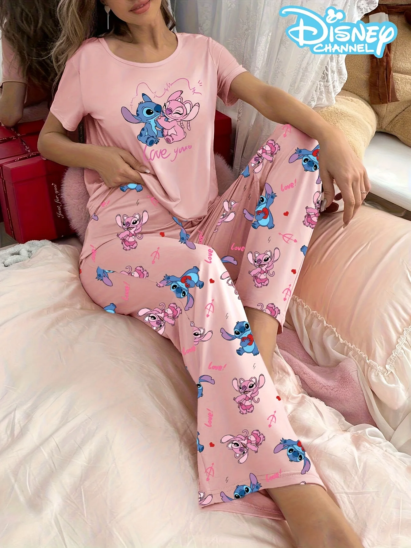 Women's pajama set with cute Disney Stitch prints, short-sleeved top and pants, comfortable for home or outdoor wear