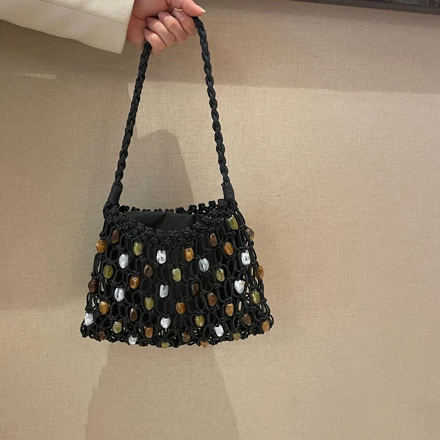 

Summer new style beach casual totes female mesh hollow out shoulder bags. Small-sized ethnic-style beaded handbag with handle.