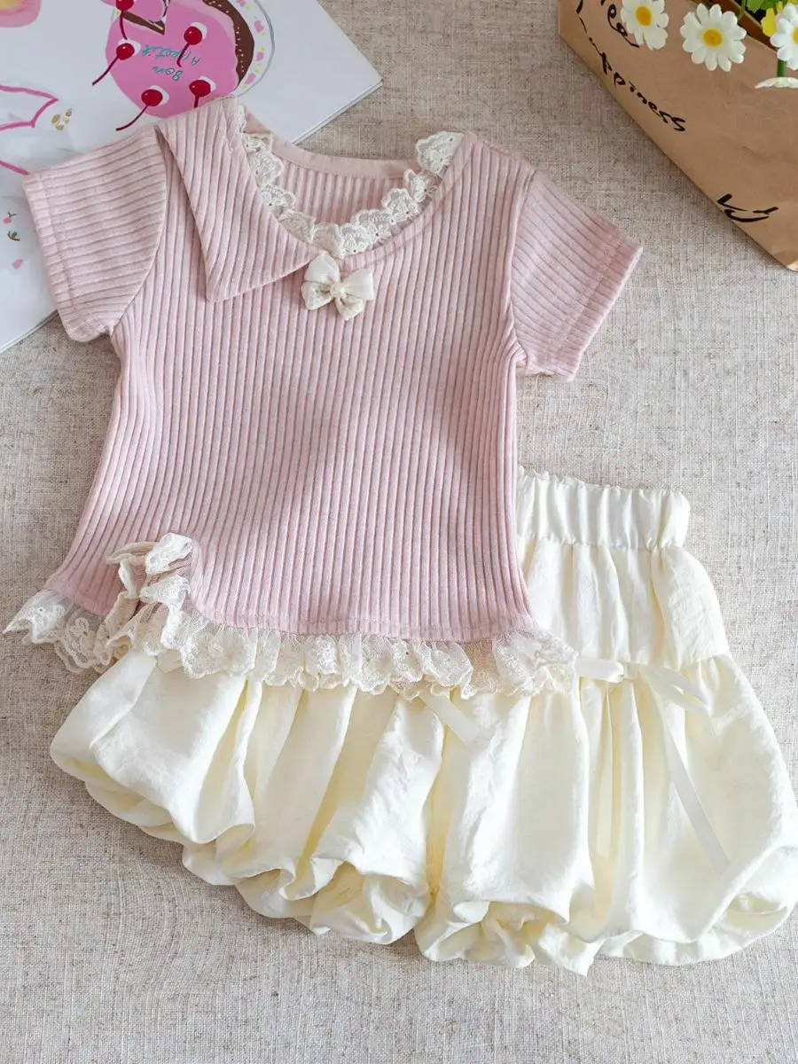 

Новинка: Летний комплект для девочек из двух предметов с мультяшным принтом – милый и удобный детский наряд (топ и шорты)