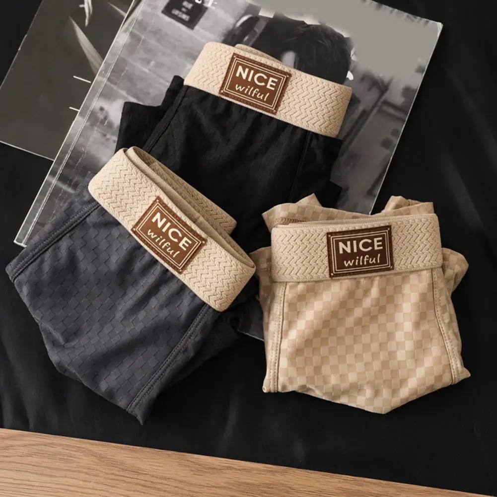 伸縮性のあるミッドウエスト下着 メンズ通気性のあるミッドウエストボクサーブリーフ レタープリントデザイン付き 男性用U字凸サポート