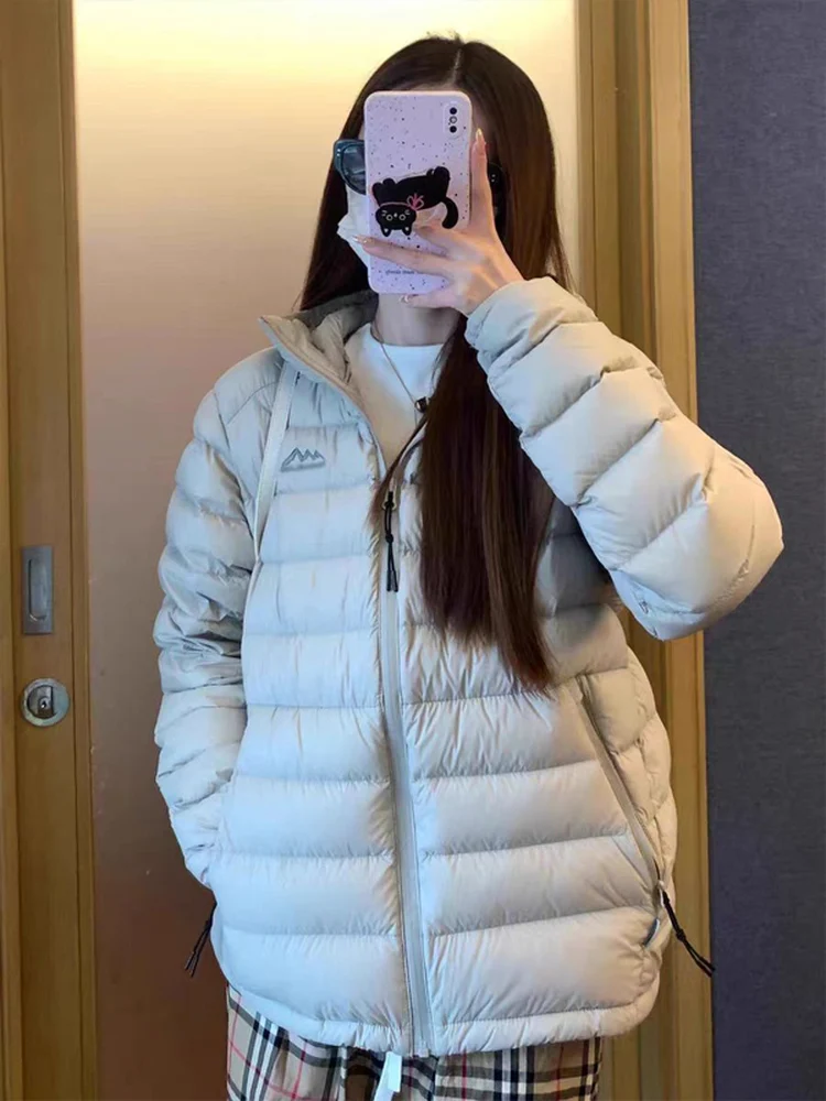 Hiver nouvelle Version coréenne femmes coupe ajustée léger à capuche vers le bas coton Jaet chaud Couple manteau longue Sve fermeture éclair