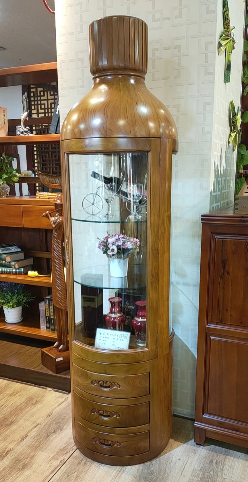 The all-solid wood wine cabinet is 2.2 meters high in round and 0.6 meters in diameter