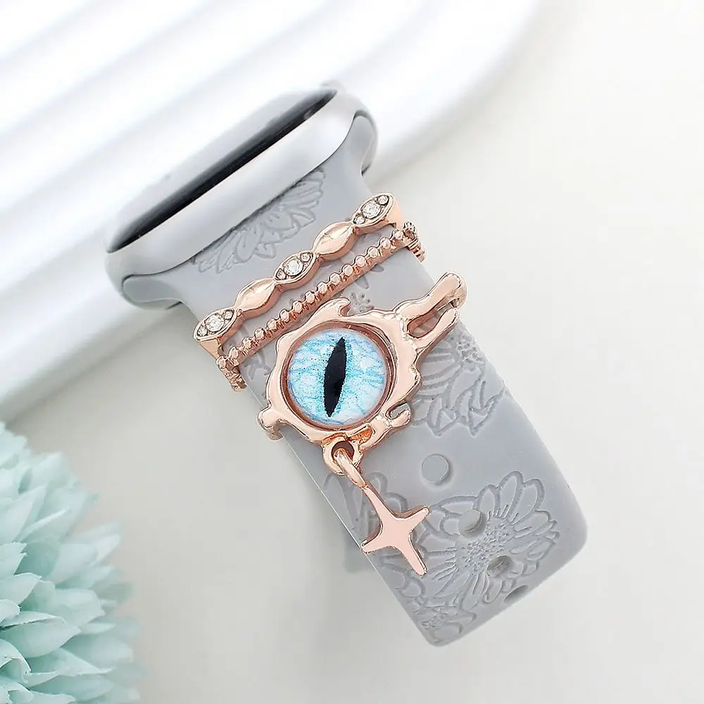 สายรัดโลหะตกแต่งแหวนเครื่องประดับเพชรสร้อยข้อมือตกแต่งตาสีฟ้า Charms เครื่องประดับสําหรับ Apple Watch Band