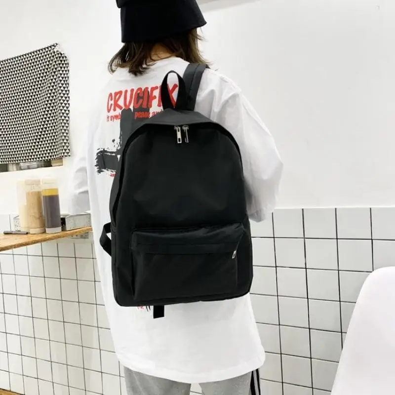 Mochila de nylon versátil para estudante escolar, bolsa de viagem, preto e branco, grande capacidade, bolsa para computador