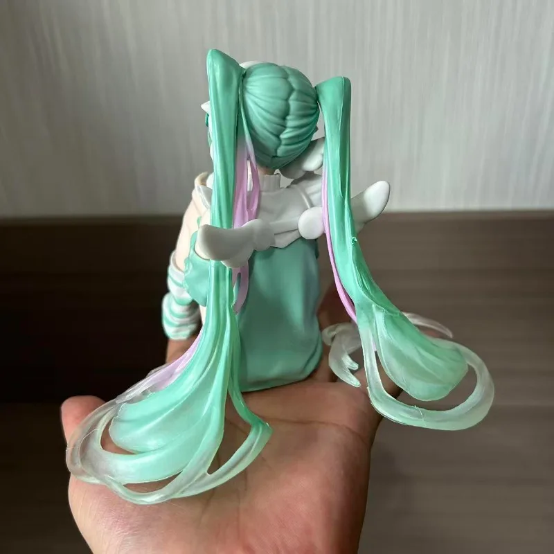 13CM High Quality New Anime Hatsune Miku Play Games Sitting Posture Kawaii Q Version Figure PVC Model Toys Doll Ornament Gifts