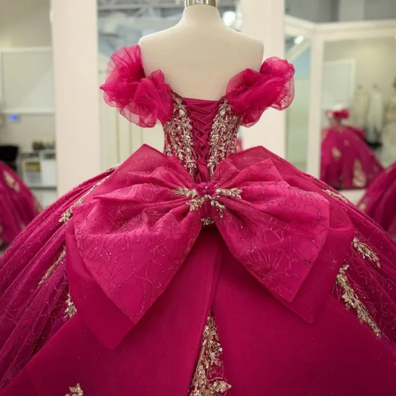 ชุดเดรสงาน Quinceanera สีชมพูโรสบลัช ประดับลูกไม้ คริสตัล ดอกไม้ 3 มิติ ผ้าทูลล์ กลิตเตอร์ โบว์  ชุดเดรสสำหรับงาน Quinceanera อายุ 15 ปี ﻿ ปรับแต่งได้