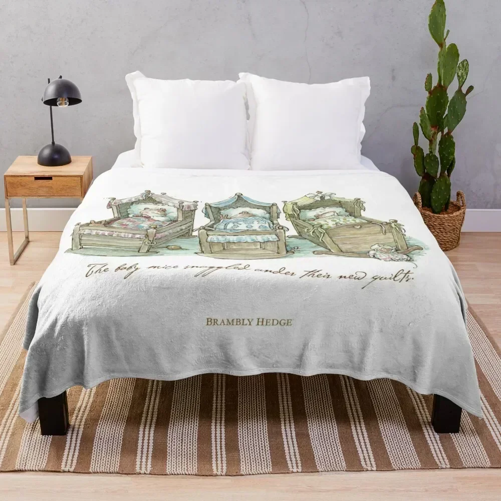 

The Brambly Hedge baby mice snuggle in their cots Throw Blanket Quilt Winter beds Blankets
