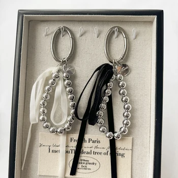 Elegante pérola fita bowknot saco pendurado decoração do telefone móvel chaveiro de luxo retro contas chaveiros jóias acessórios da menina