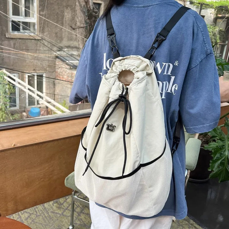 Fashion Drawstring Backpack for Women Trendy Nylon Shoulder Bag with Mesh Detail, Lightweight Casual Daypack for Travel