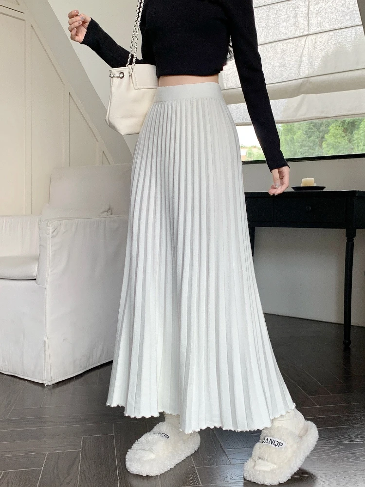 

Knitted pleated skirt women in autumn and winter 2025 new elastic high waist slimming A-line casual umbrella long skirt