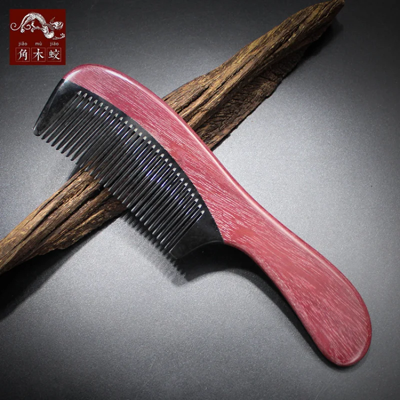 

Comb made of hornwood and purple heart wood with buffalo horn, for massage and hair styling