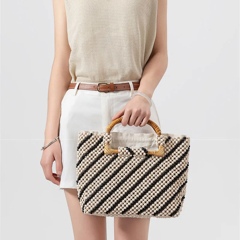 2026 Trendy Large Capacity Wooden Bead Handbag New Color Block Hollow Out Bead Tote Bag Casual Travel Beach Bag for Women