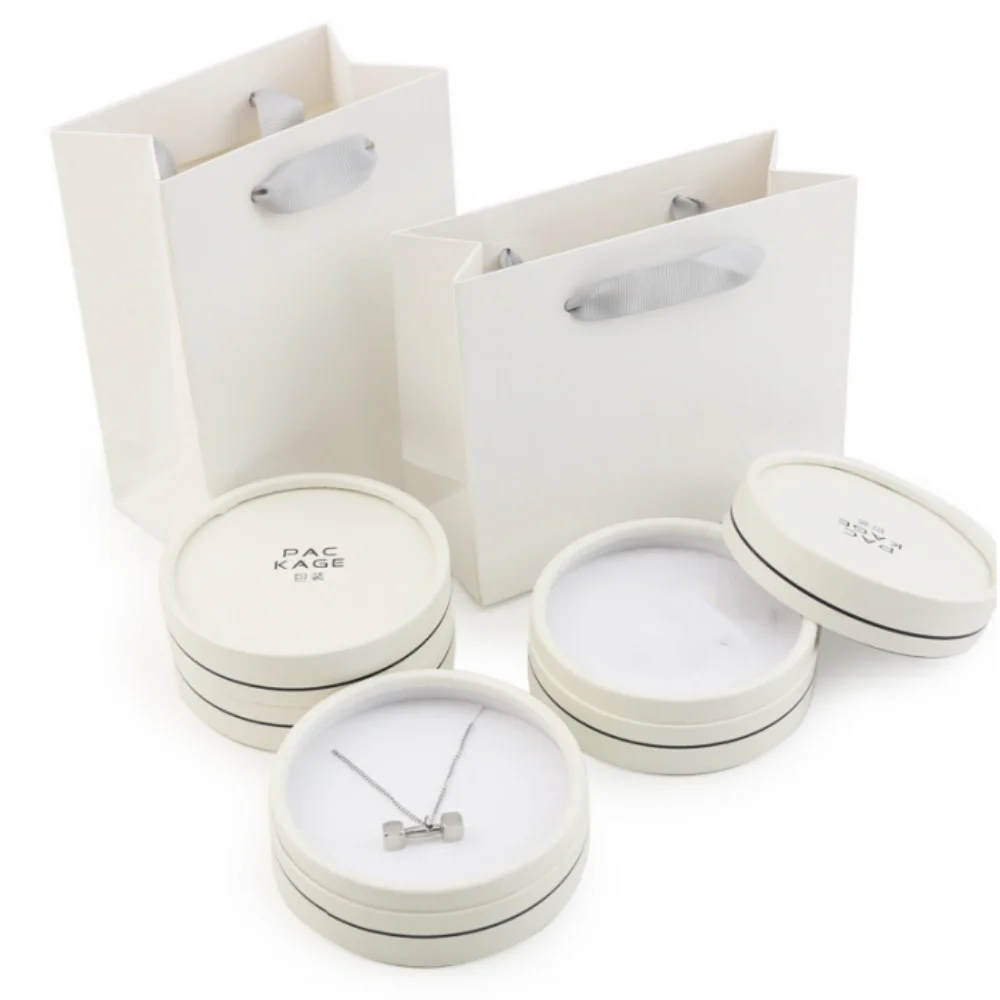 Caja de embalaje de joyería Circular, venta al por mayor, minimalista, blanco, anillo de papel grueso, pendientes, collar, colgante, almacenamiento, caja de regalo de joyería