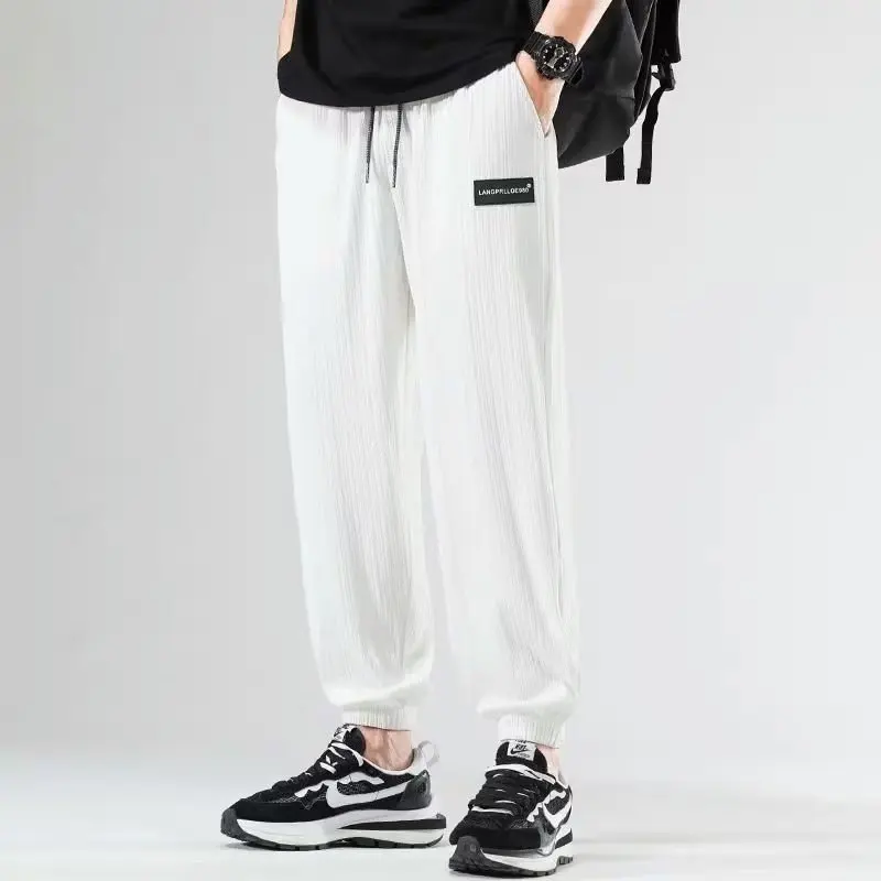 

Ice Silk Casual Pants Men's Summer Thin Four-Sided Elastic New Sle Cuffed Qui Dry Sports Nine-Point Air Conditioning