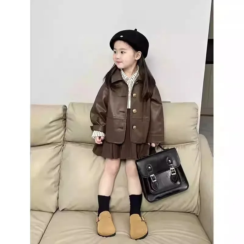 

Childrens Suit Spring and Autumn New Korean Girls Fashion Leather Coat Striped Shirt Solid Color Pleated Skirt Three Piece Set