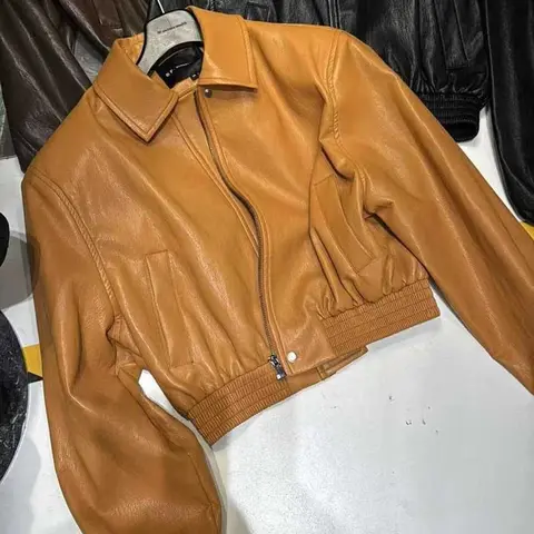 Utländsk stil modern vit orange läderjacka dam höst koreansk version lös och tunn midja jacka 10 best sales orange jacka för kvinnor - №6