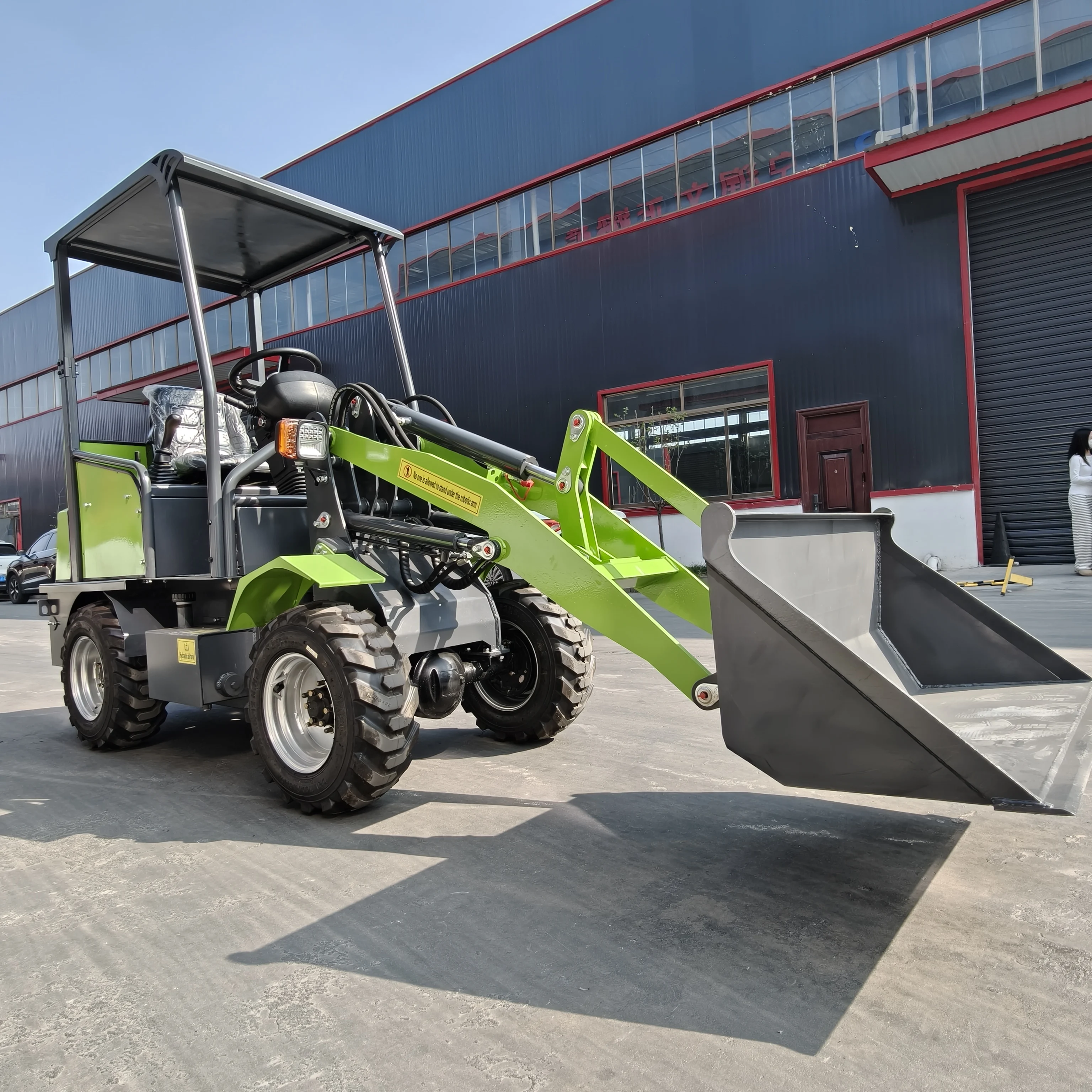 Smallest Electric Mini Wheel Loader 4WD Ultra Compact Front End Loader Zero Emission Small Loader For Narrow Way